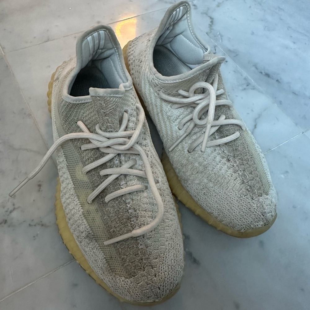 Cream Yeezy sneakers